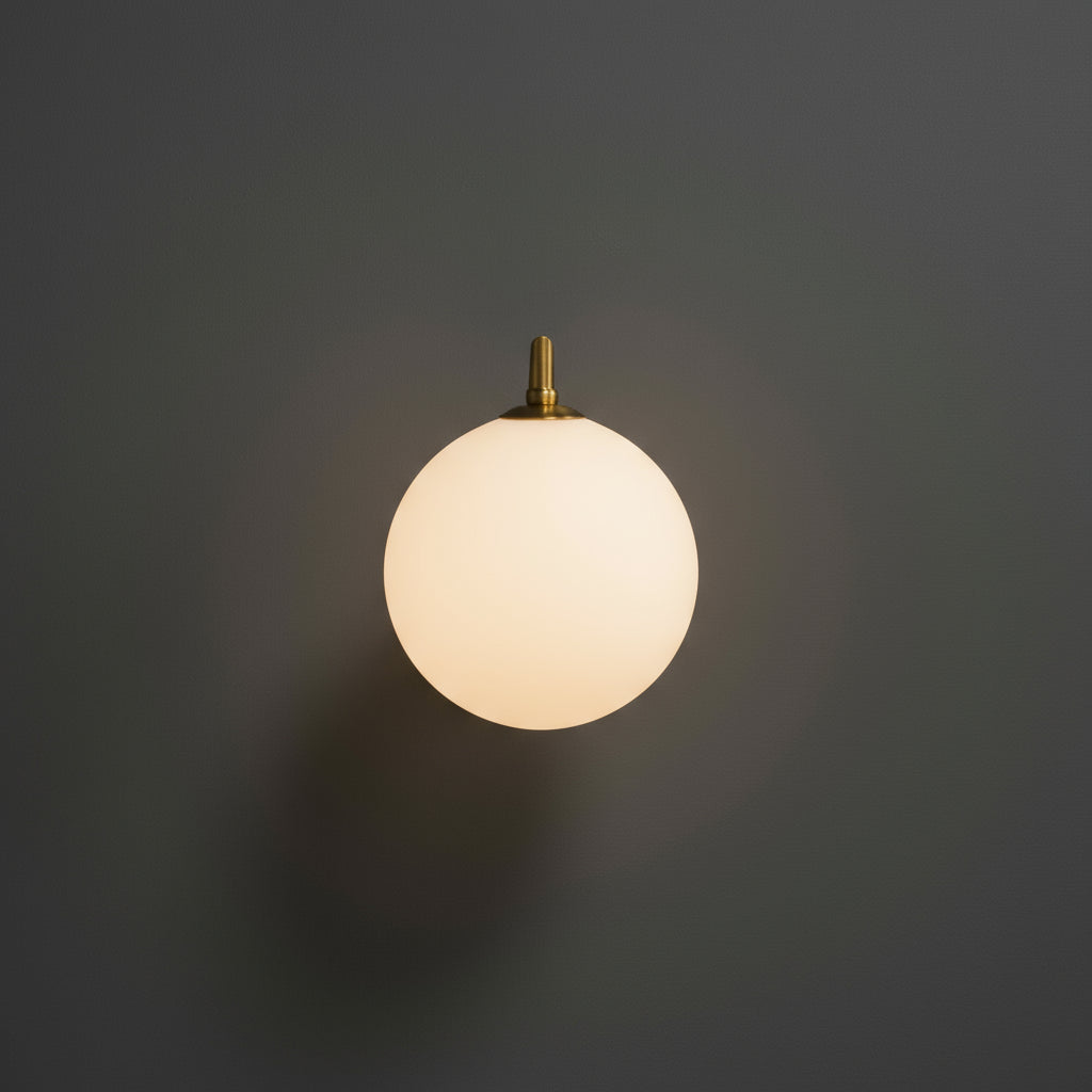 Modern Brass Wall Light | Curved Arm Clear Glass Globe Sconce Indoor