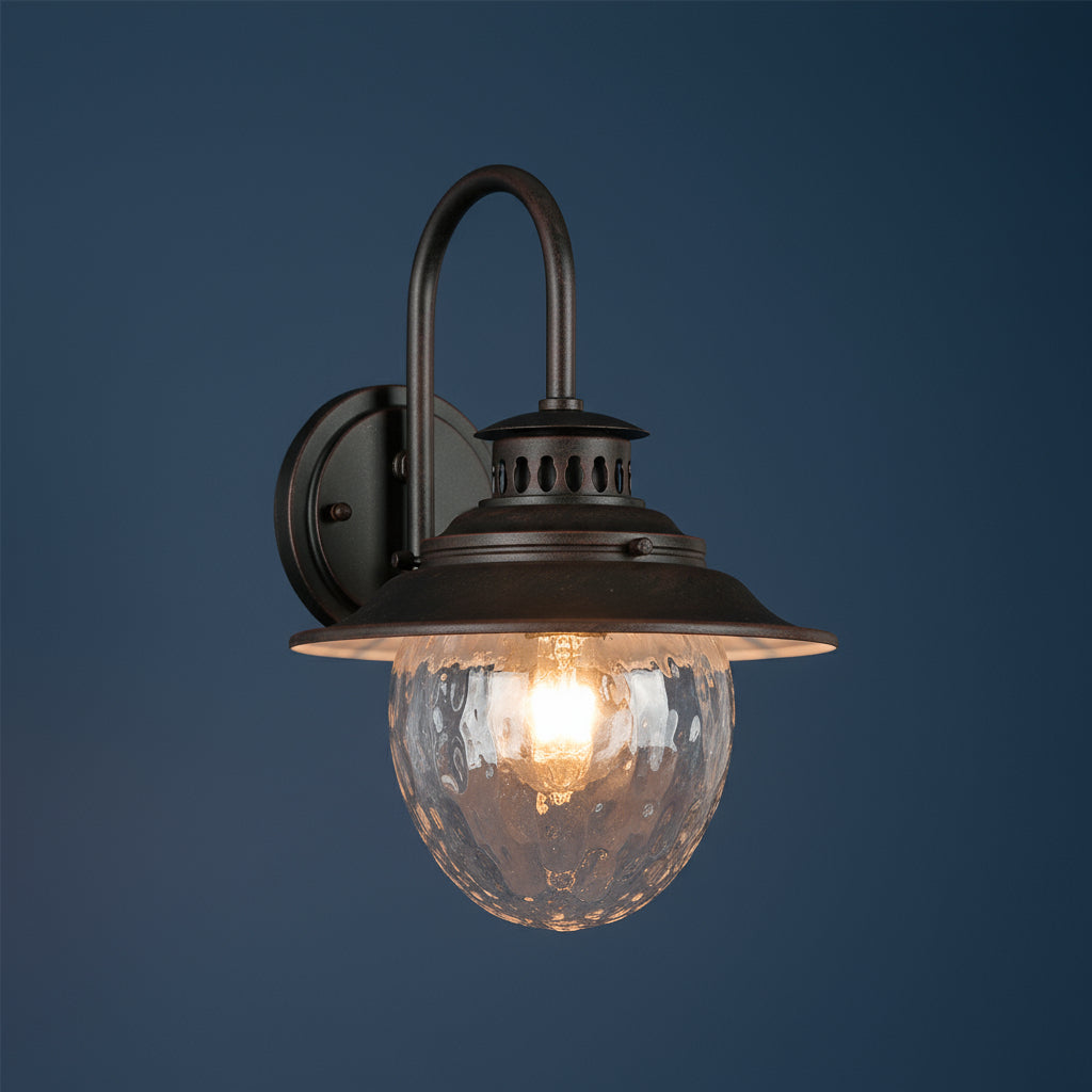 Antique Brass Outdoor Wall Light | Industrial Lantern-Style Sconce Curved Arm Hammered Glass Shade Outdoor Lighting